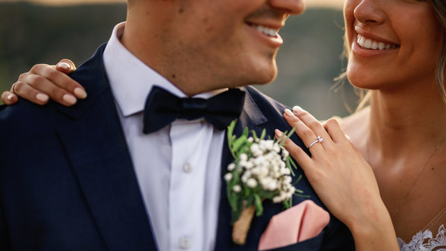 Close-up of happy newlyweds on their wedding day.