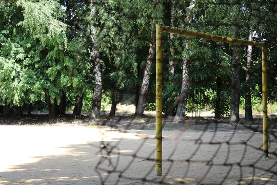 Old football field behind the fence