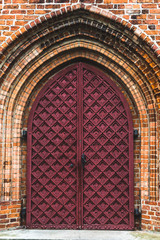 Ilawa Lakeland (Poland).  Prabuty cathedral main entrance