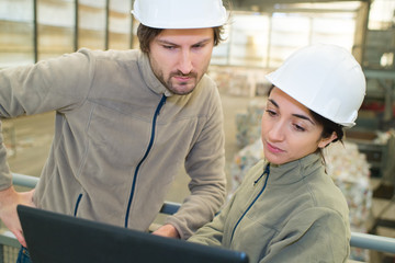 workers in recycling factory