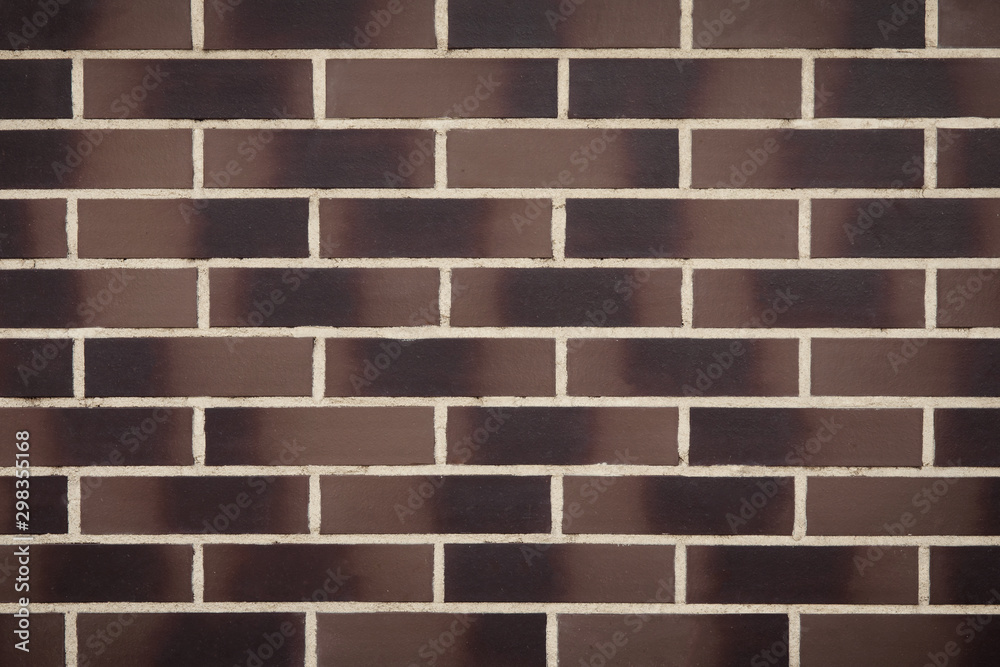 Wall mural smooth brown brick wall texture background