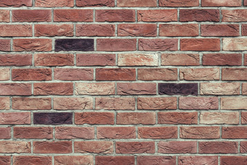 Multicolored brick wall texture background 