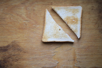 Baked bread on a wooden board