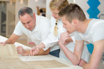 studying a wooden designed wall paper