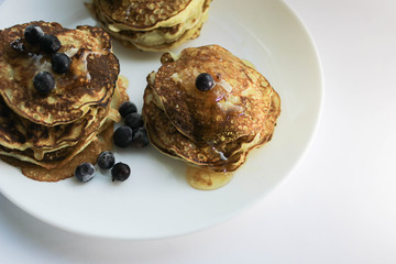 Pancakes on a white plate