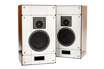 Two audio speakers on white background.