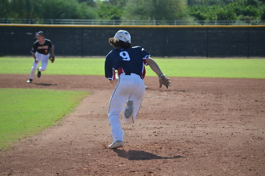 Baseball Player stealing second base - Powered by Adobe