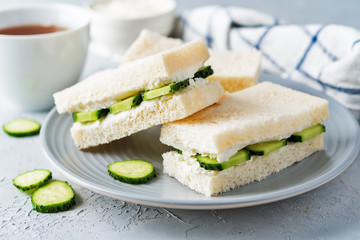 Cucumber cream cheese sandwiches on the plate