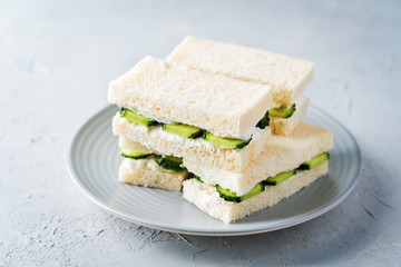 Cucumber cream cheese sandwiches on the plate