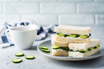 Cucumber cream cheese sandwiches on the plate