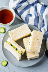 Cucumber cream cheese sandwiches on the plate