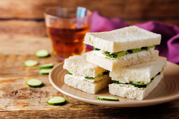Cucumber cream cheese sandwiches on the plate
