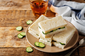 Cucumber cream cheese sandwiches on the plate