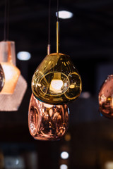 Modern streamlined mirror oval copper chandelier. Bubble metal copper gold shade pendant