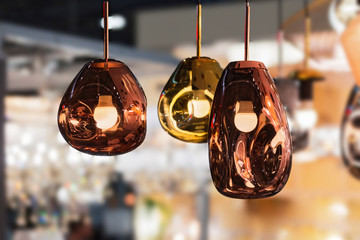 Modern streamlined mirror oval copper chandelier. Bubble metal copper gold shade pendant
