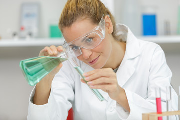 a happy female lab worker