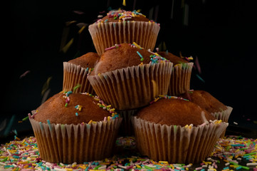 cupcakes with color frosting and sprinkles