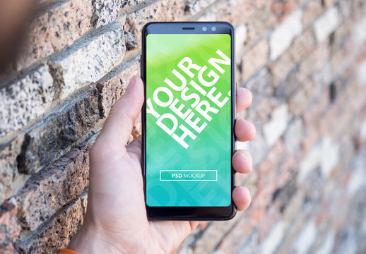 Person Holding Full Screen Smartphone Mockup