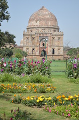 Medieval ruins in a colorful garden in Delhi, India