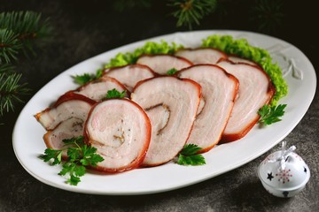 Boiled pork belly roll in onion peel with bay leaf.