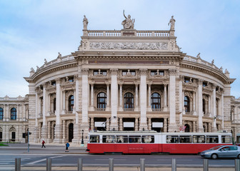Fototapeta na wymiar Street view with public tram near Burgtheater in Hofburg Vienna