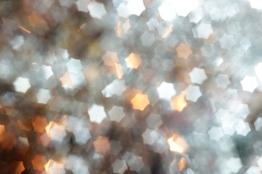 Christmas background and new year concept, abstract defocused light background with bokeh and blur. Winter banner for your text, background image or layer for overlay in the photo editor, out of focus