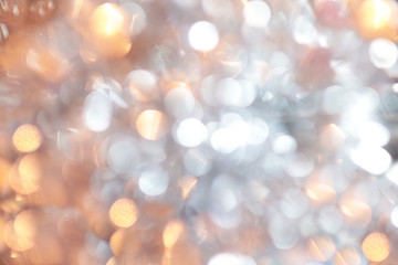Golden christmas background and new year concept, abstract defocused light background with bokeh...