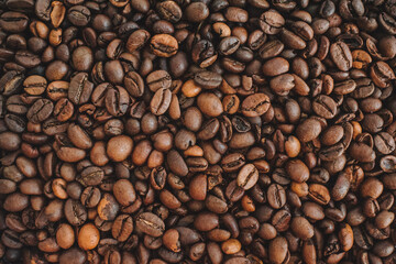 Obraz premium Co0ntinuous coffee bean background