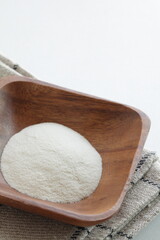 White agar powder on wooden plate for cooking image