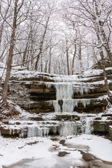 winter landscape with a frozen waterfall