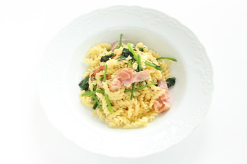 Italian food, bacon and spinach Fusilli short pasta