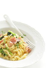 Italian food, bacon and spinach Fusilli short pasta