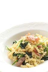 Italian food, bacon and spinach Fusilli short pasta