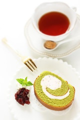 gourmet dessert, green tea Swiss roll on dish