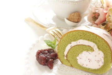 gourmet dessert, green tea Swiss roll on dish