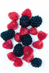 organic rasberries and blackberries over head macro still life image