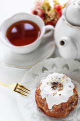 icing Christmas cake on white dish