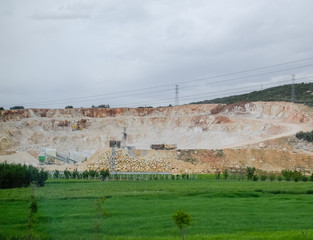 Fototapeta na wymiar Marble quarry quarrying white marble in open pit