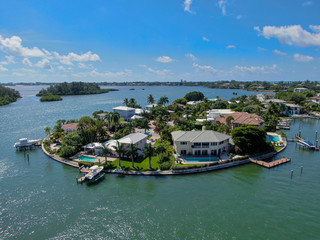 Aerial view of luxury villas and their private boat in Bay Island, in Sarasota, Florida, USA