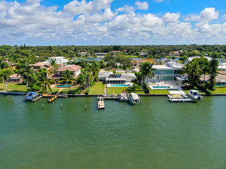 Aerial view of Bay Island neighborhood, luxury villas and boat, in Sarasota, Florida, USA