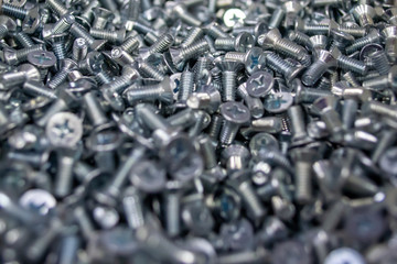 Large number of metal, steel bolts. Macro. Close-up. Background and texture.