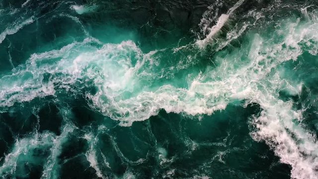 Waves of water of the river and the sea meet each other during high tide and low tide.