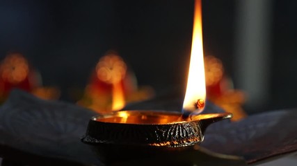 Metal Diyas lit up for the Indian Hindu festival of Diwali, the festival of lights.
