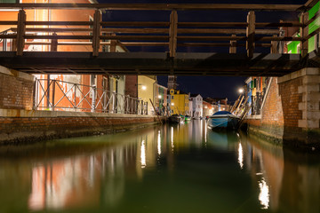 long exposure photo of a bridge over a water canal in Burano  Italy