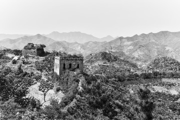 Fototapeta premium A close-up of the observation window of the beacon tower of the Great Wall, ancient China, in yumuling, Qianxi County, Hebei Province, China. Black and white monochrome.