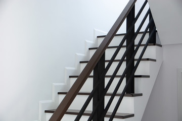Stairs for walking up and down in the house white wall