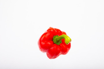 Red bell peppers on a white background,Fresh sweet peppers,Water droplets on organic fresh vegetables