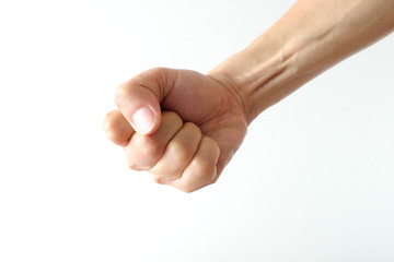 Man's hand, he fist hand as a symbol