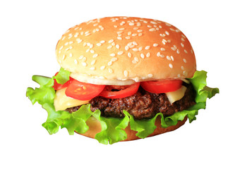Delicious hamburger sandwich with meat, cheese and fresh vegetables.  or a sandwich for breakfast or lunch.  Juicy Cheeseburger, isolated on white background