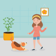 girl and dog playing in the house pet care